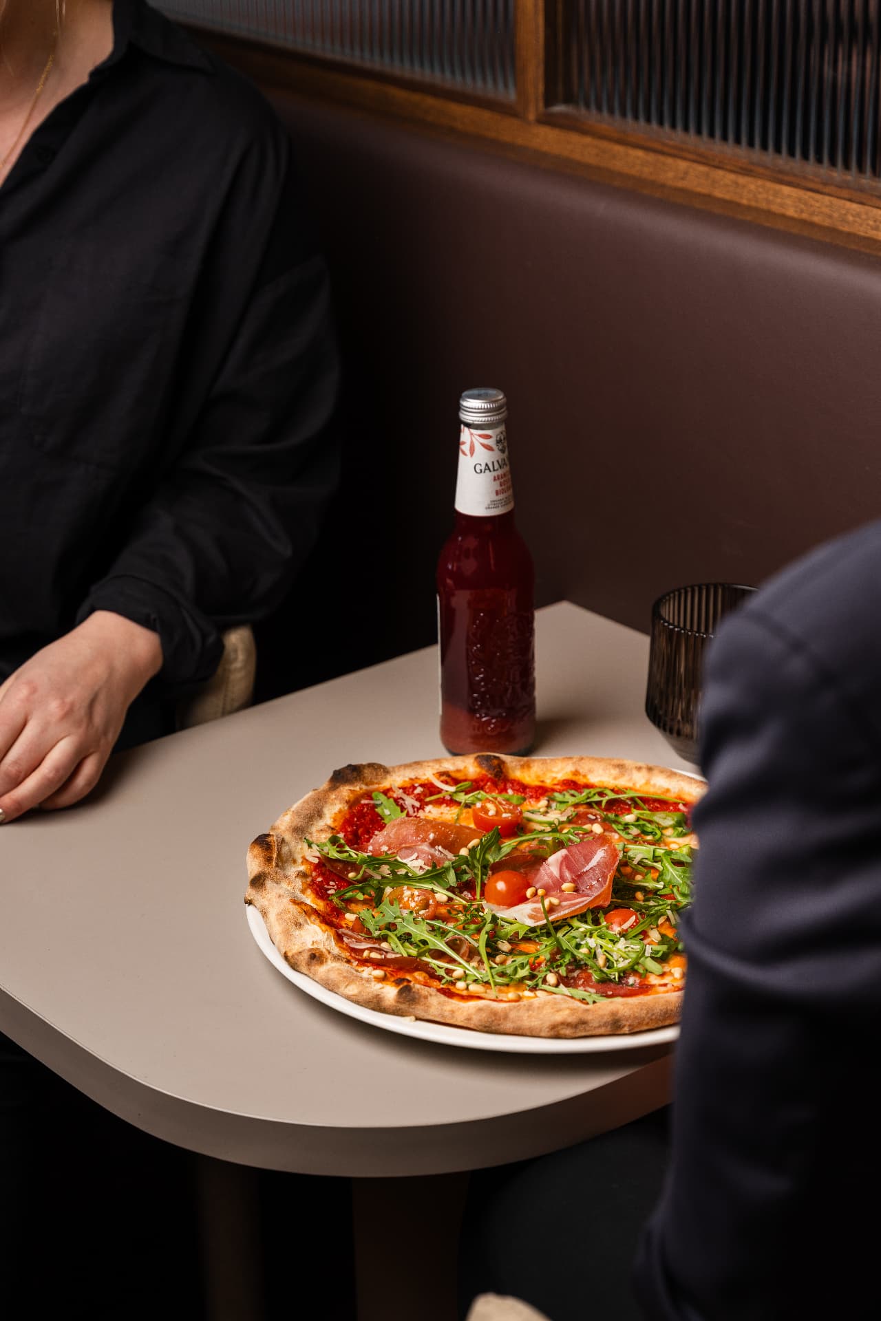 Fresh pizza served before a social gaming evening